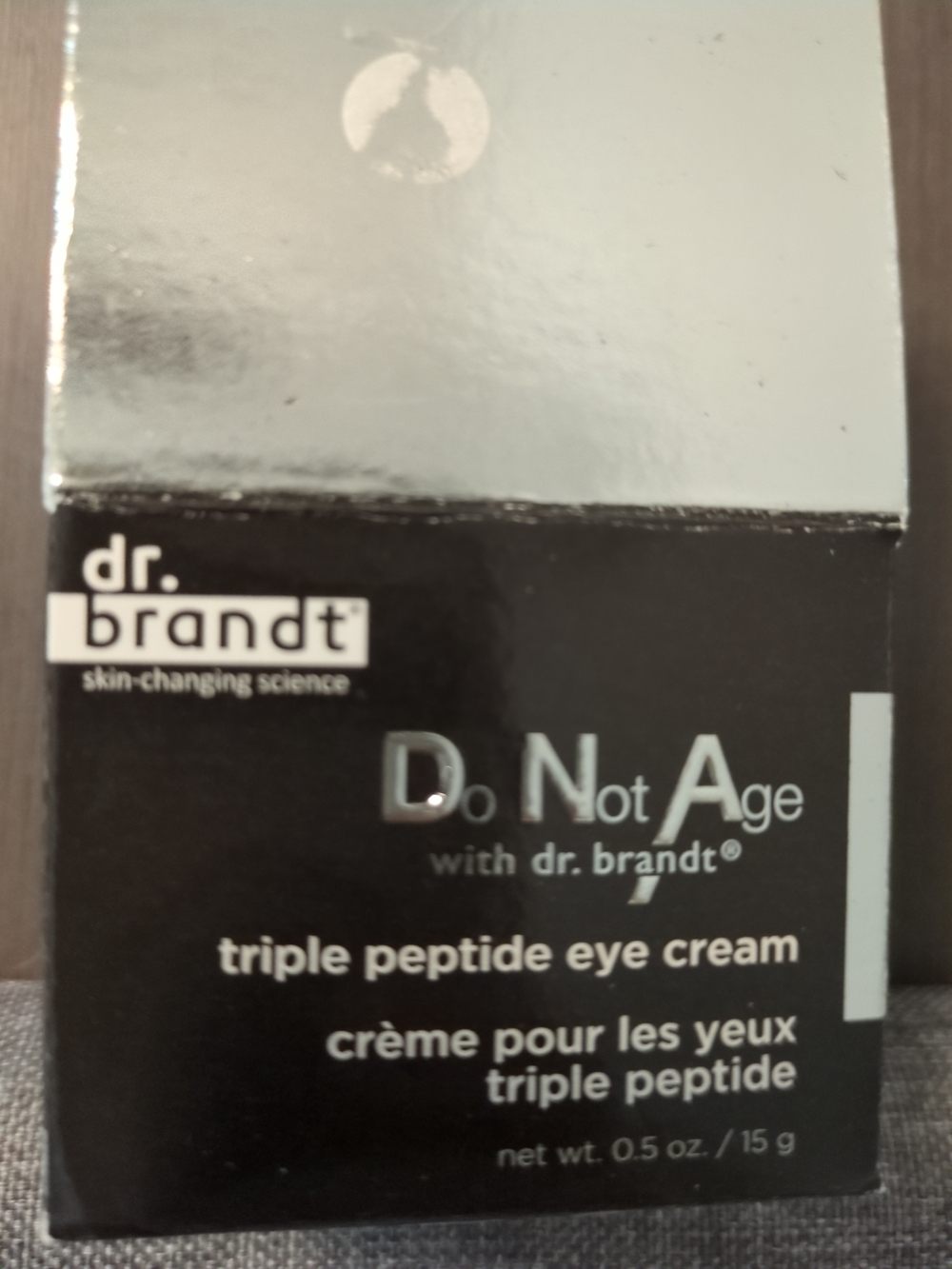 Dr. Brandt Triple Peptide Eye Cream in Black and Silver